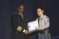 Police chief presents award to a beat officer