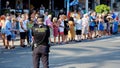 Police control safety of bike riders and spectators during La Vuelta sports competition