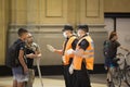 Police controlling the commuters at train station