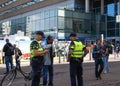 Police cordoning off area to stop people protesting on the streets against lockdown measures by the dutch government in the city