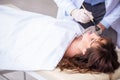 Police coroner examining dead body corpse in morgue Royalty Free Stock Photo