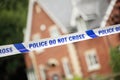 Police crime scene in front of house Royalty Free Stock Photo