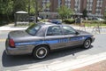 Police cruiser parked on side of road Royalty Free Stock Photo