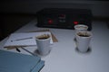 Police Custody Interview Room - Cassette Recorder and Coffee Cups Royalty Free Stock Photo