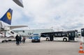 Police customs van near Lufthansa aircraft in airport