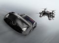 Police drone chasing black car for speed over Royalty Free Stock Photo