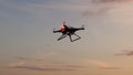 Police drone flies against time-lapse sky background