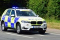 Police Escort BMW car on road