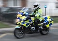 Police escort motorcycle, attending the Tour de Yorkshire cycle race, Kippax, UK.