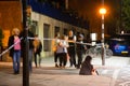 Police and evacuees stand at edge of exclusion zone in Bath