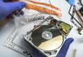 Police expert examines hard drive in search of evidence