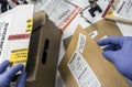 Police expert saved in a box records and evidence of a case of murder in the laboratory scientist