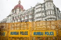 Mumbai, India - 20 august 2019: police fence protects taj mahal palace hotel in mumbai, wich was the target of islamic terror