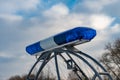 Police flashers on a snowmobile close up, police all-terrain vehicle in winter, air-cushion boat