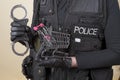 Police handcuffs and a supermarket trolley Royalty Free Stock Photo