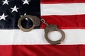 police handcuffs on the usa flag Royalty Free Stock Photo