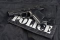 police handgun on black uniform Royalty Free Stock Photo