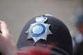 Police hat helmet famous bobby metropolitan closeup with copy space