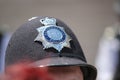 Police hat helmet famous bobby metropolitan closeup with copy space
