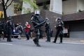 Police in heavy riot gear with batons in Portland, Oregon. Royalty Free Stock Photo