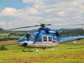 Police helicopter in action, propellers are turning and the machine is ready to fly. Royalty Free Stock Photo