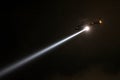 Police Helicopter with searchlight at night Royalty Free Stock Photo