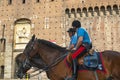 Police on horses at the magnificent Sforza Castle in Milan Italy.