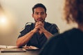 Police, investigation and man listening to woman for report, interrogation or criminal arrest. Law, crime and bribery Royalty Free Stock Photo