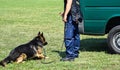 Police man with his dog Royalty Free Stock Photo