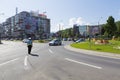 Policeman restricting the traffic on a street Royalty Free Stock Photo