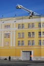 A police man stand by artificial building facade. Moscow Kremlin.