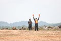 Police marshaller standby Marshalling signals to Helicopter Take off