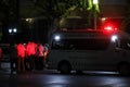 Police medical evacuation center van standby behind riot police front line