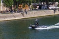 PARIS, FRANCE - JUNE 23, 2017: Police motor boat on the Seine river in the center of Paris Royalty Free Stock Photo