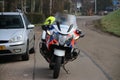 Police motor at an incident in Moordrecht in the Netherlands in white color. Royalty Free Stock Photo