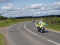 A Police Motorbike on a Country Road near to Friockheim in Angus as part of the Brechin Harley Davidson in the City Meet.