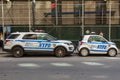 Police NYPD Smart car and Ford - traffic SUV on the Manhattan street. Royalty Free Stock Photo