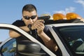 Police Officer Aiming Handgun Royalty Free Stock Photo