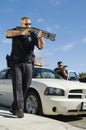 Police Officer Aiming Shotgun Royalty Free Stock Photo