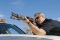 Police Officer Aiming Shotgun Royalty Free Stock Photo