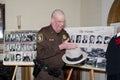 Police officer displays items from st valentines day massacre Royalty Free Stock Photo