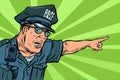Police officer cop points directions Royalty Free Stock Photo