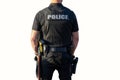 Police officer on duty in uniform with gun and taser - back of officer on white background