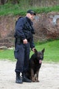 Police officer with a German Shepherd Royalty Free Stock Photo