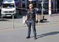 Police officer guarding the road during bomb threat