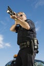 Police Officer With Gun Royalty Free Stock Photo