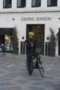 Police officer patrol financial street one bike in Copenhagen