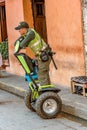 Police officer patrols the streets in old town Cartagena, Colombia