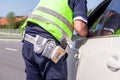 Police officer writing a ticket Royalty Free Stock Photo