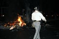 Police examines a fire set by rioters at University of Maryland